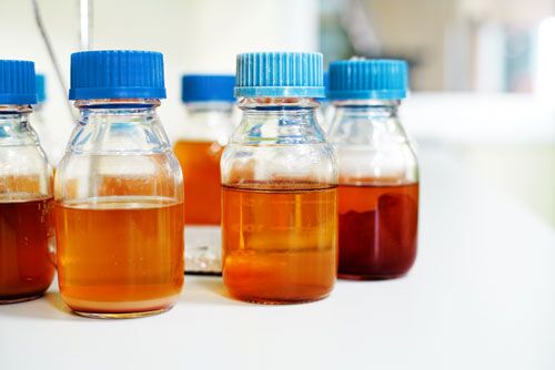 cell culture media sitting on research bench waiting for analysis