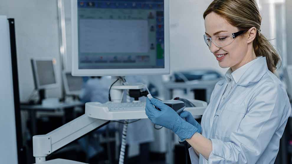 researcher scans sample barcode into lims software